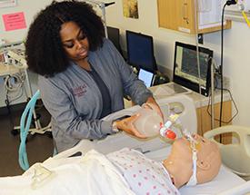 Male student at respiratory machine